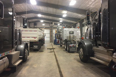 group of trailers in garage